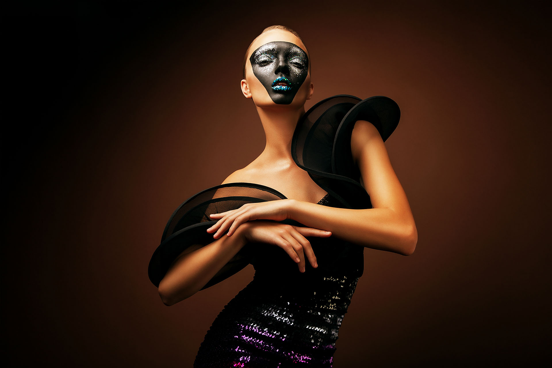pretty woman in black dress with mask