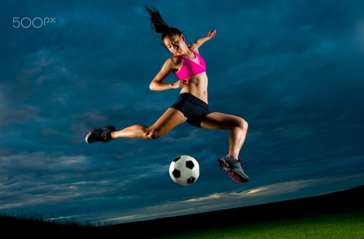 Japanese woman playing soccer