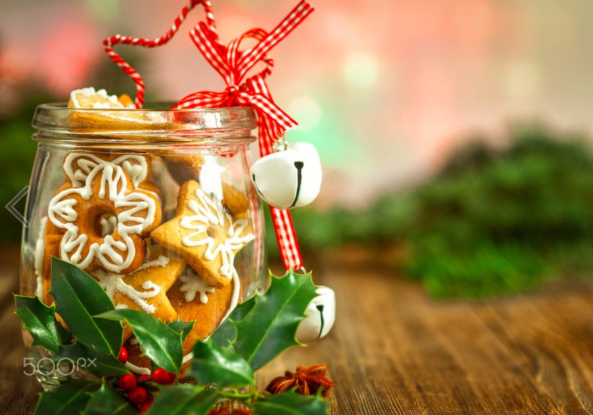 christmas-cookies-in-a-jar-on-wooden-background