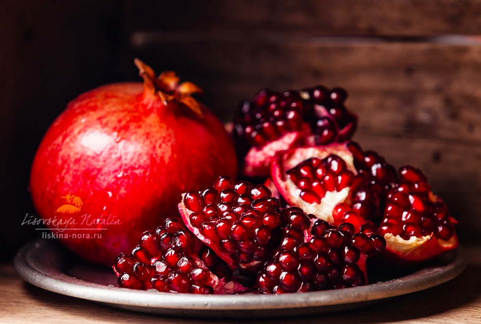 Pieces and grains of ripe pomegranate