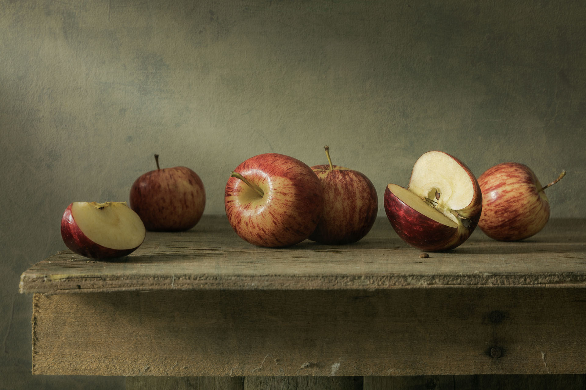 Still life photography with apples on wood table