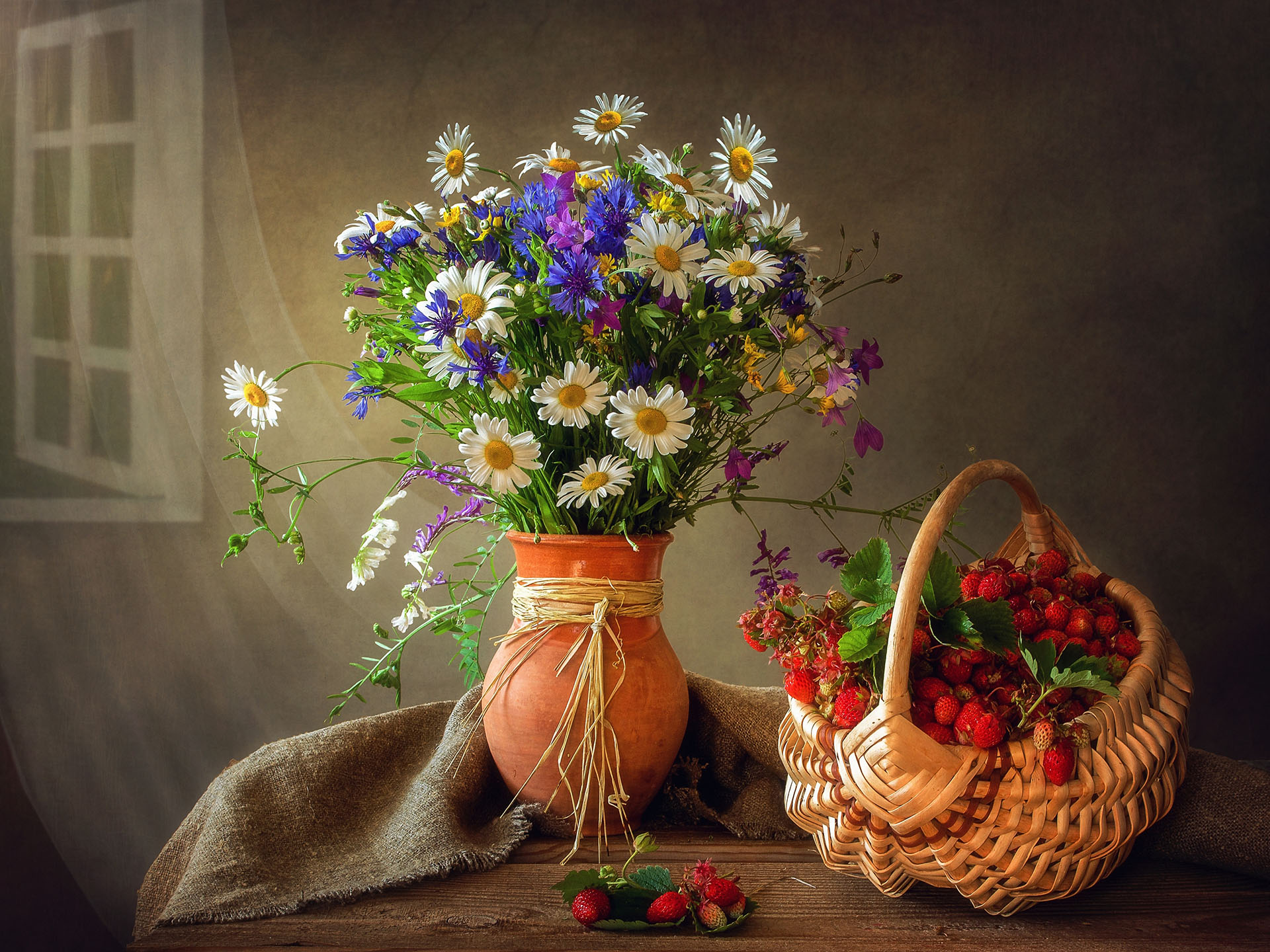 Still life with a forest strawberry