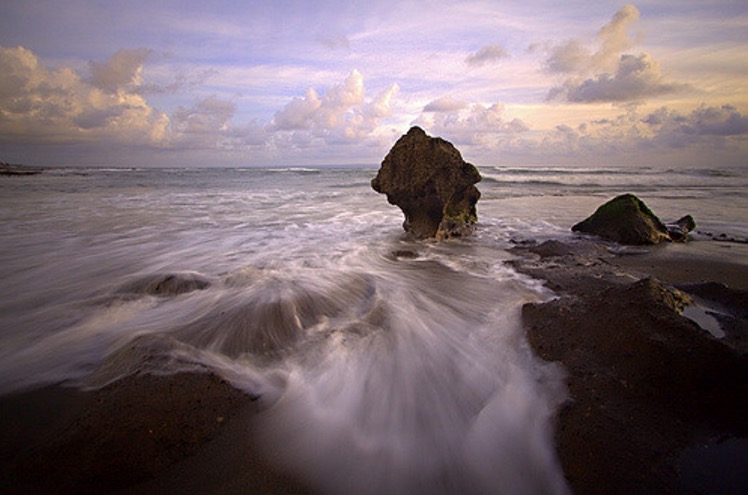Amazing how the water swooshes up to the sea stack