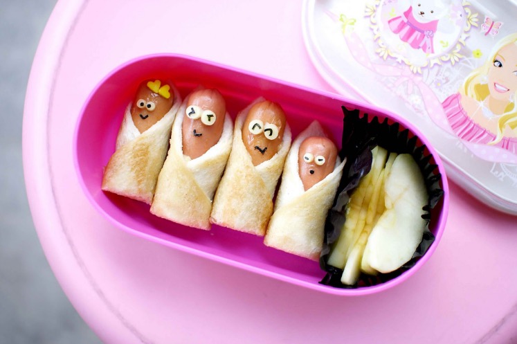 Sausages, bread, cheese and apple