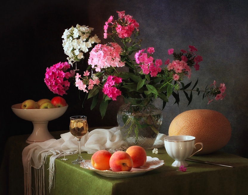 With a bouquet of phlox and ...
