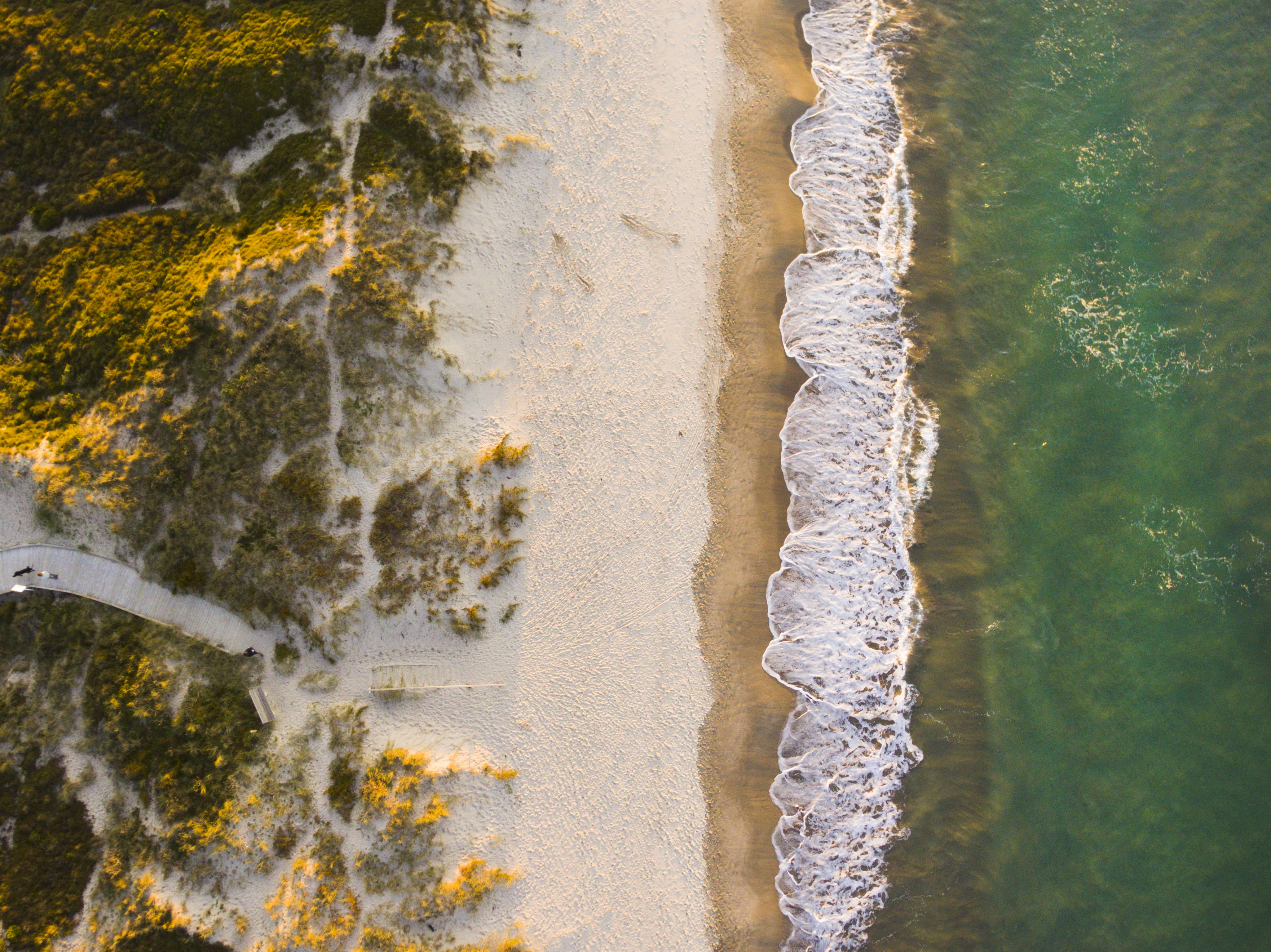 East coast white sand beach aerial photography. Drone photography of a beach