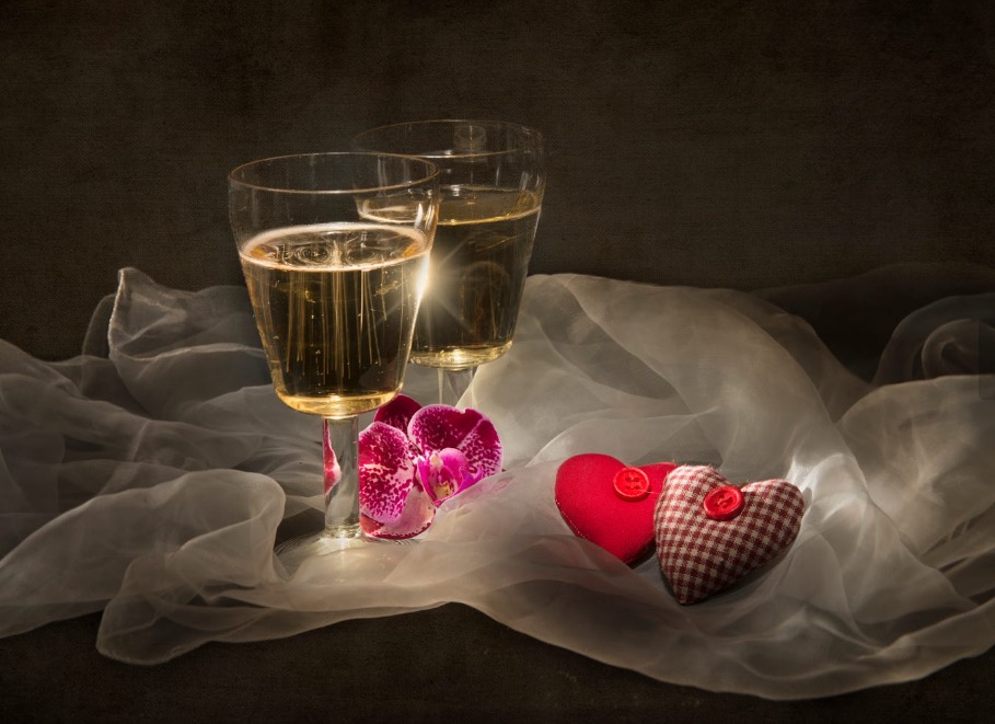 Still life with two hearts and champagne