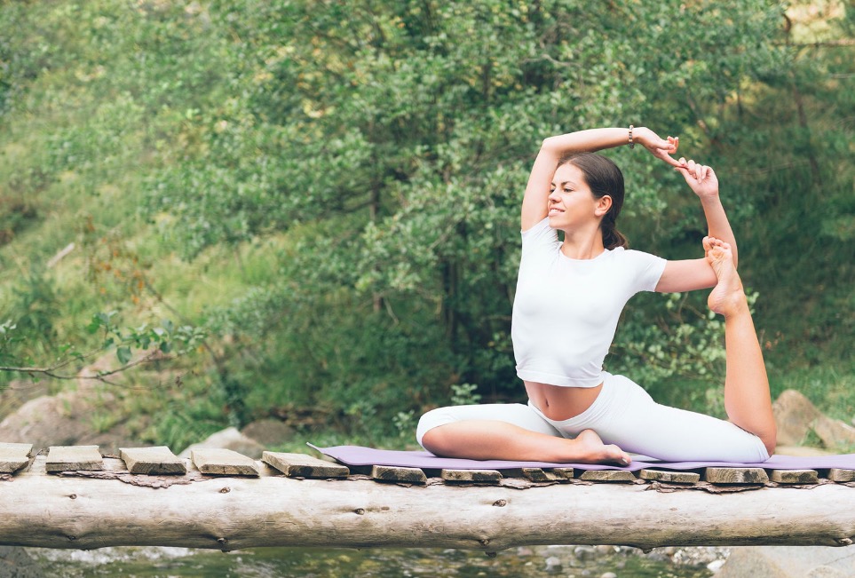 Women doing yoga in nature.