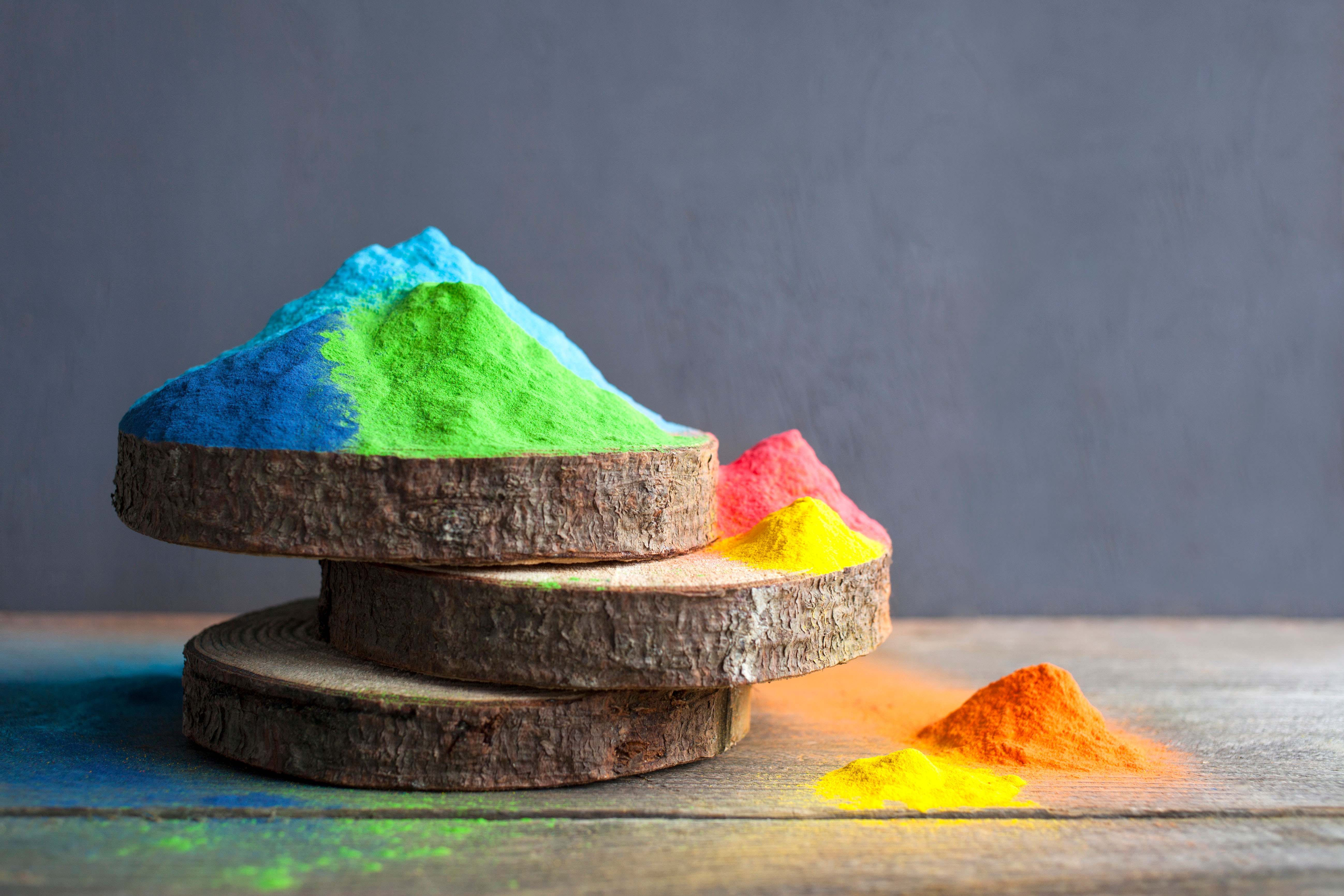 Bright colours on sawed wood for Indian holi festival