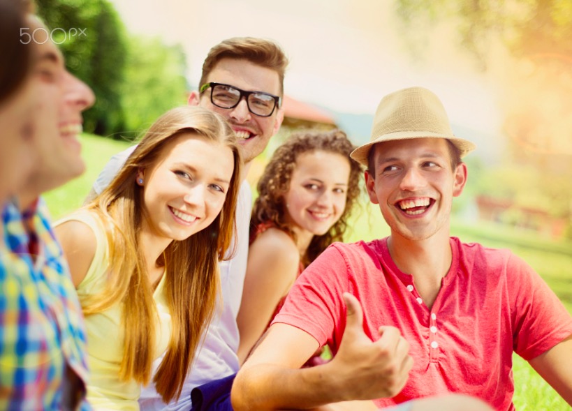 Friends having fun in park