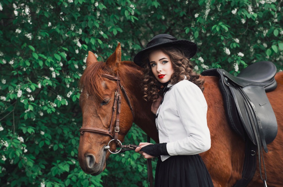 Woman walking with horse