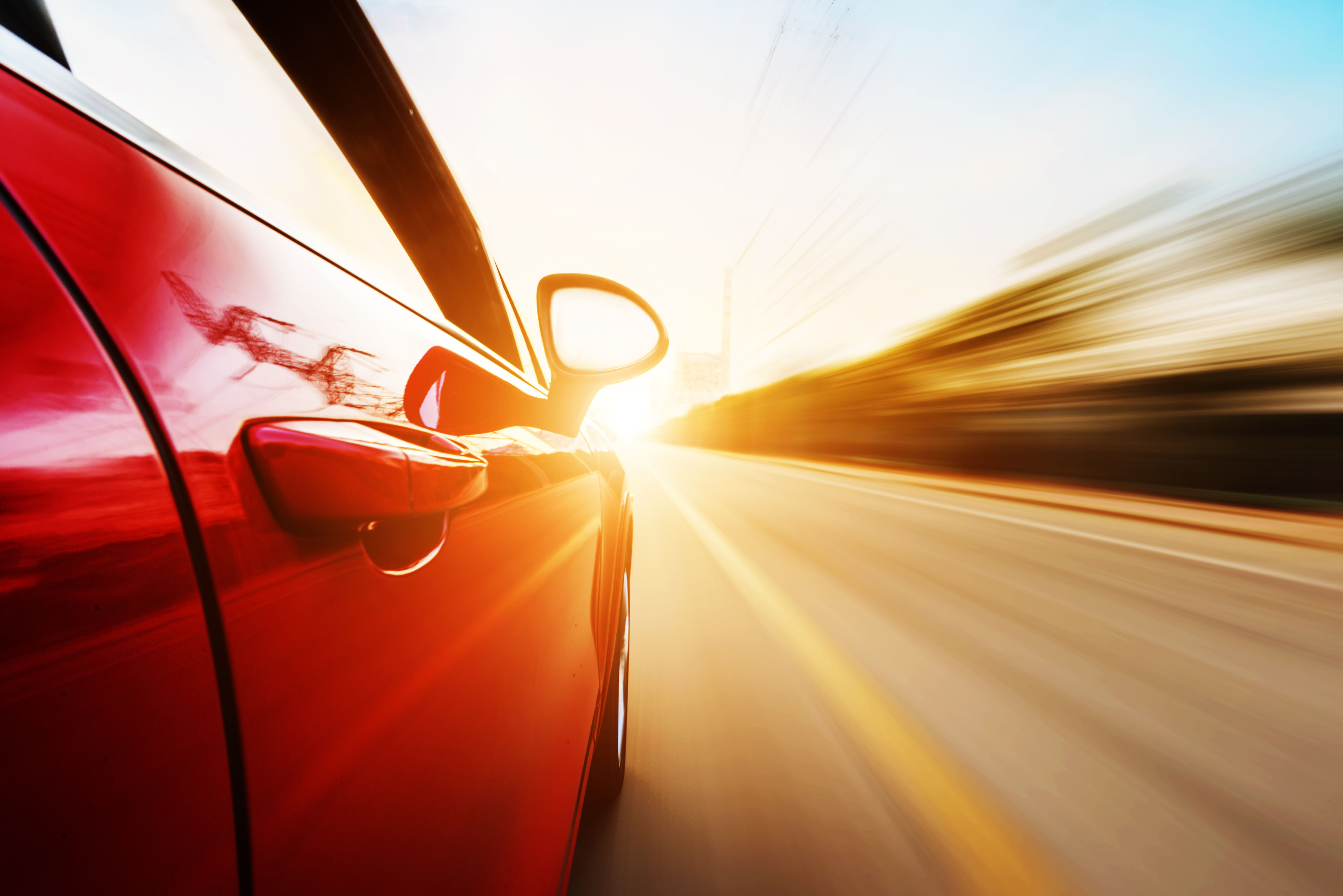 A car driving on a motorway overtaking other cars