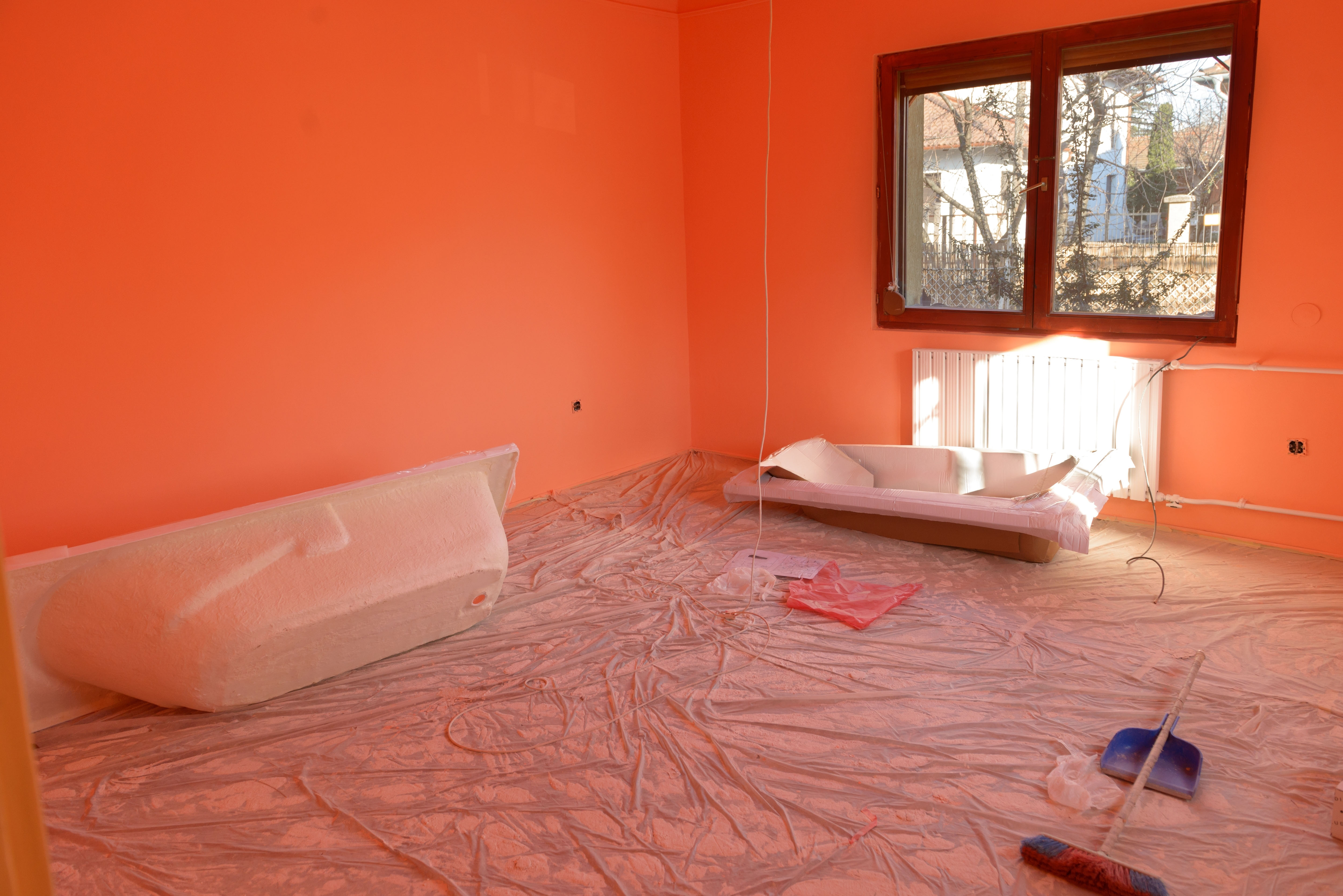 Empty newly painted room in orange color
