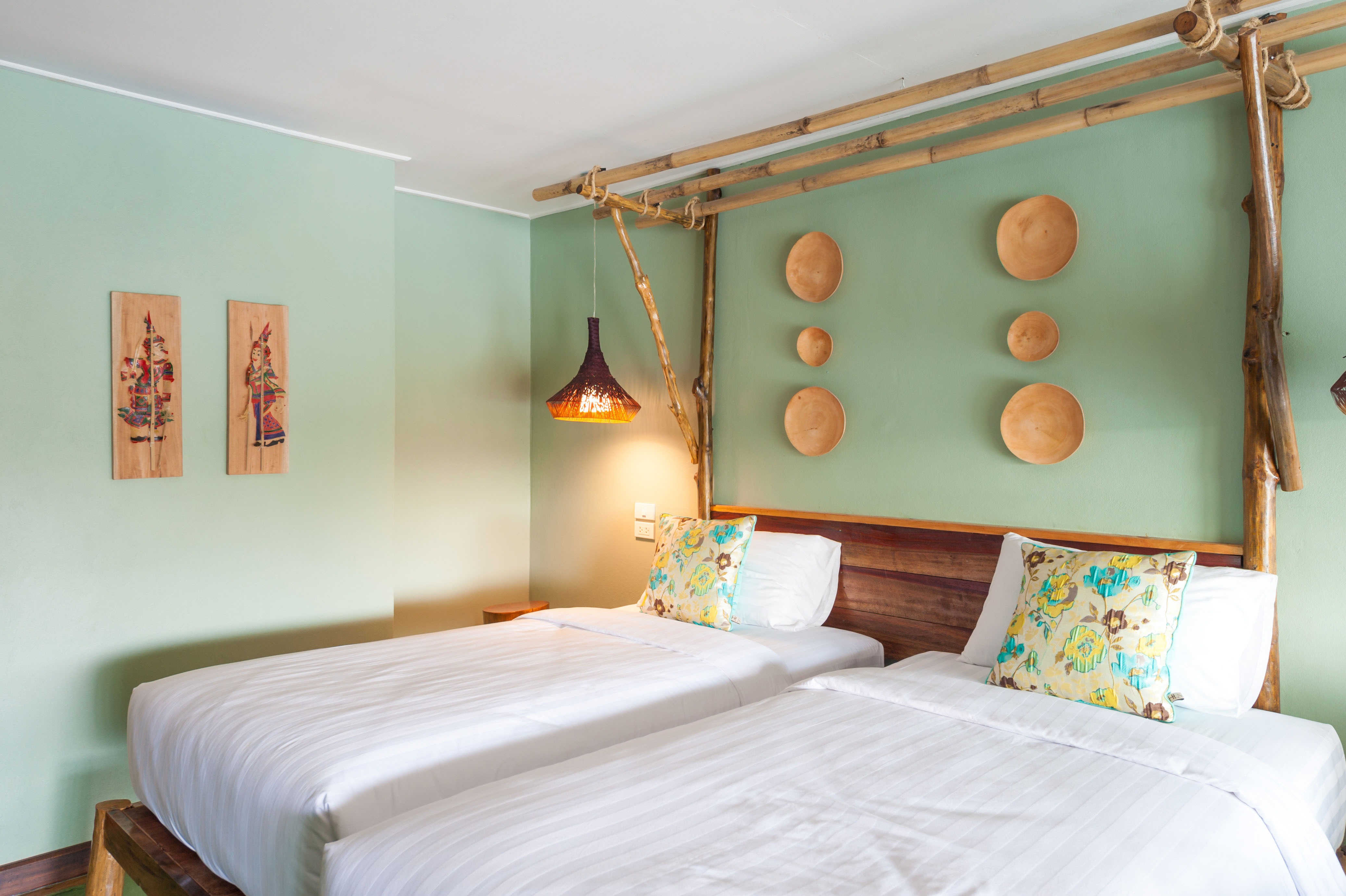 Two beds bedroom with bedside lamp