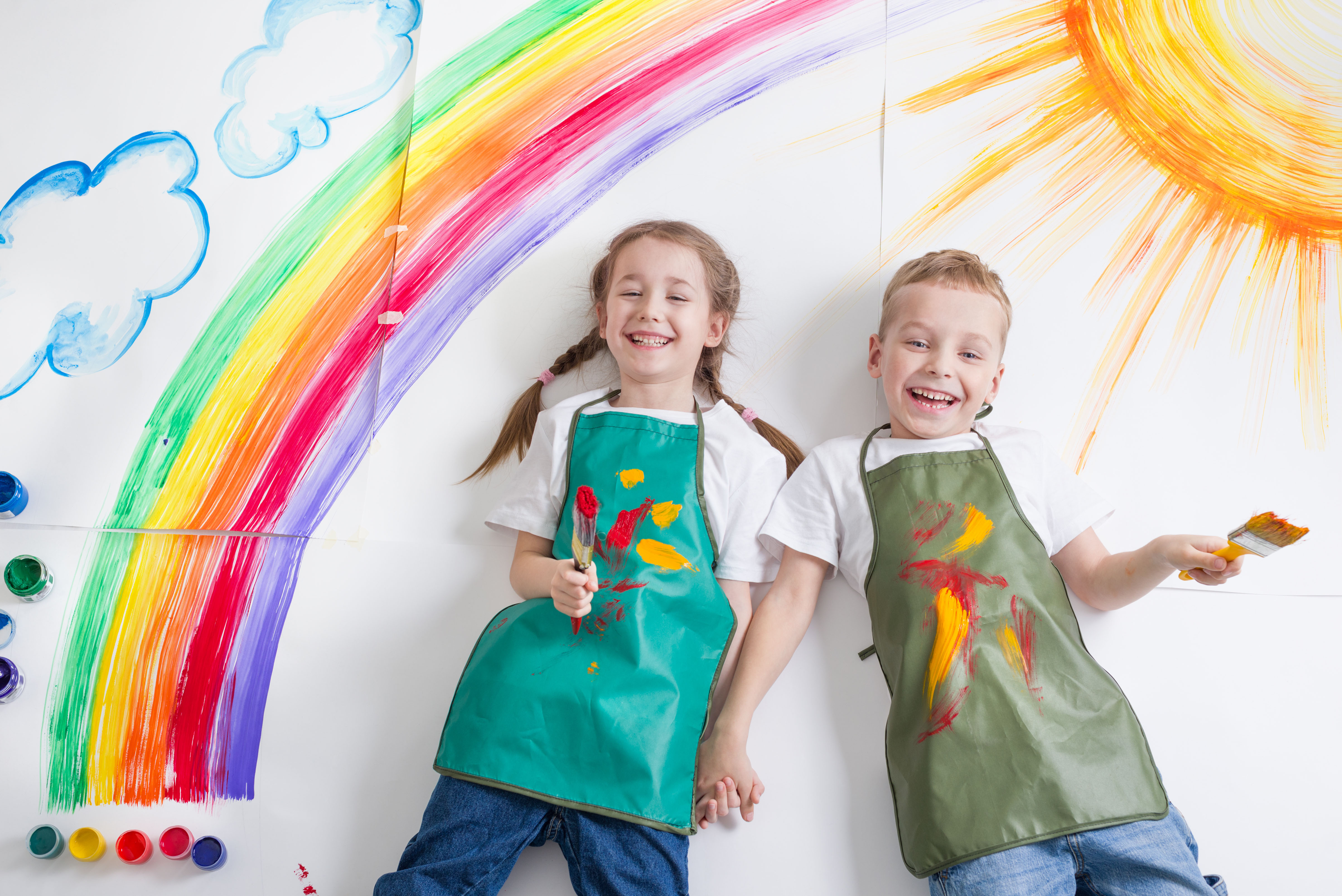 kids painting rainbow