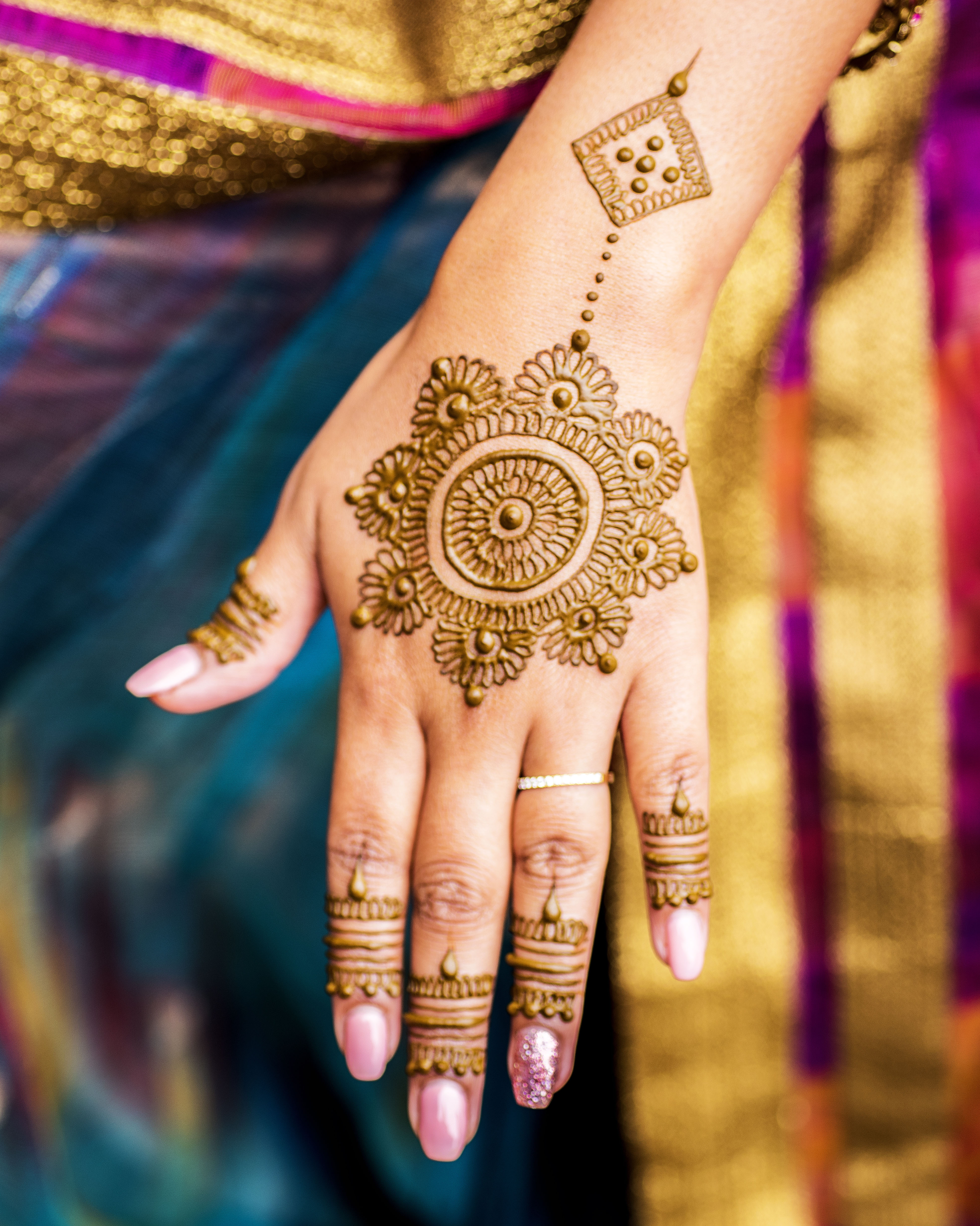 Carefully painted intricate design using henna