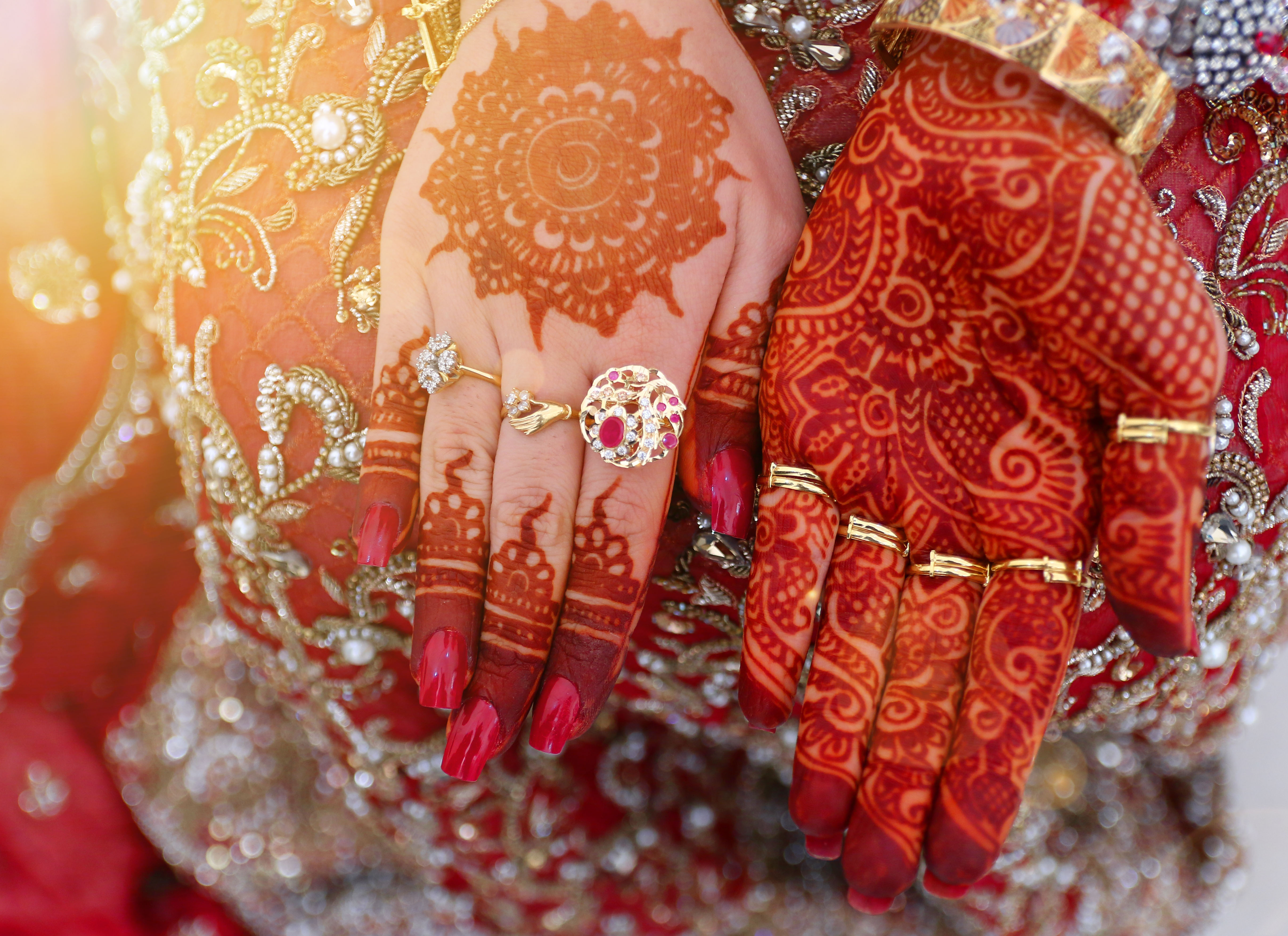 Woman Hands with black mehndi tattoo