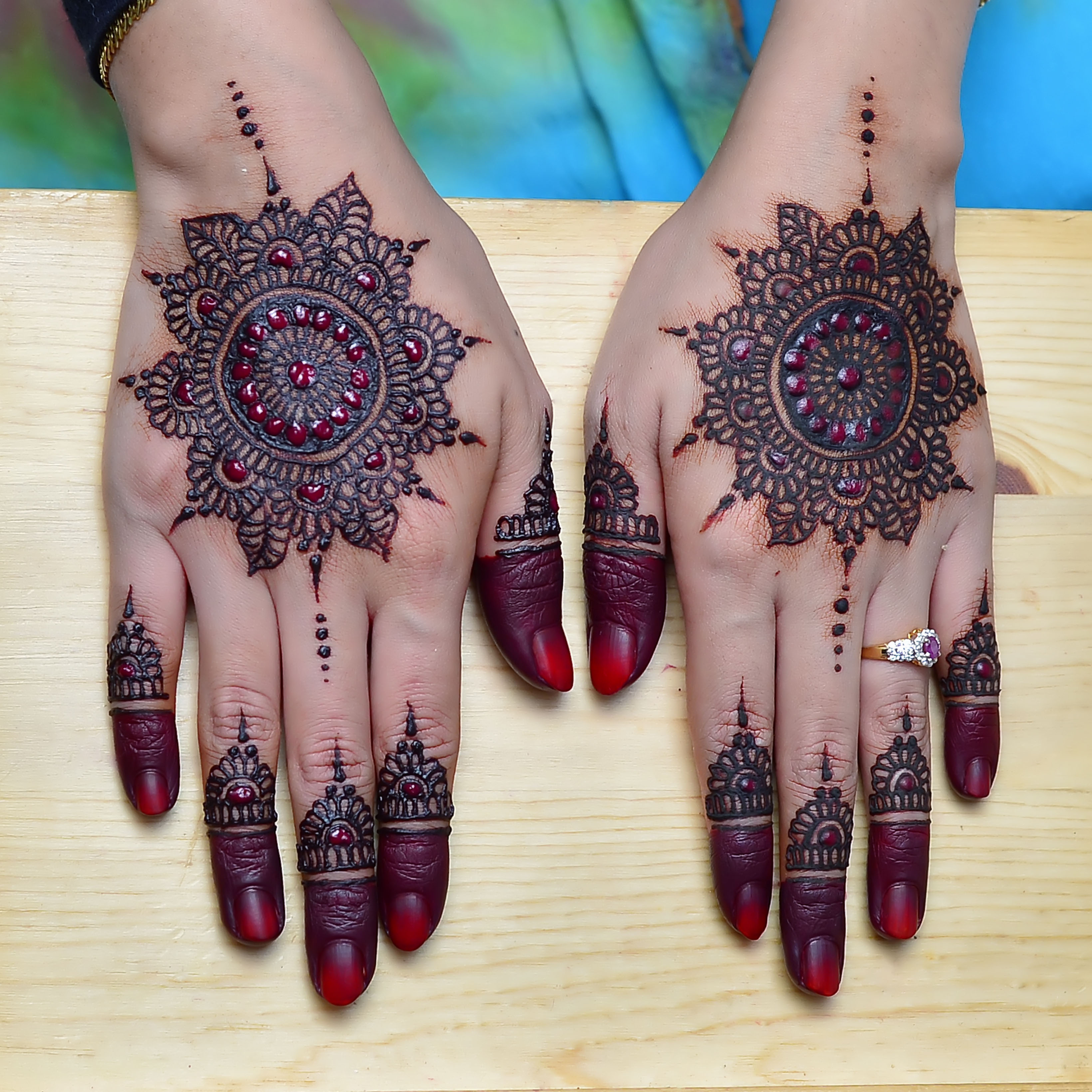 Woman Hands with black mehndi