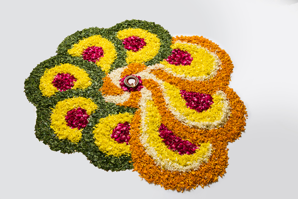 flower rangoli for Diwali or pongal made using marigold