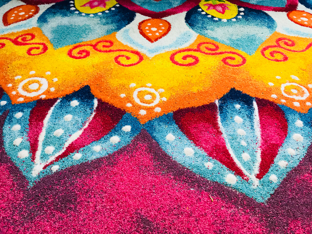 Rangoli coloured grain rice mosaic