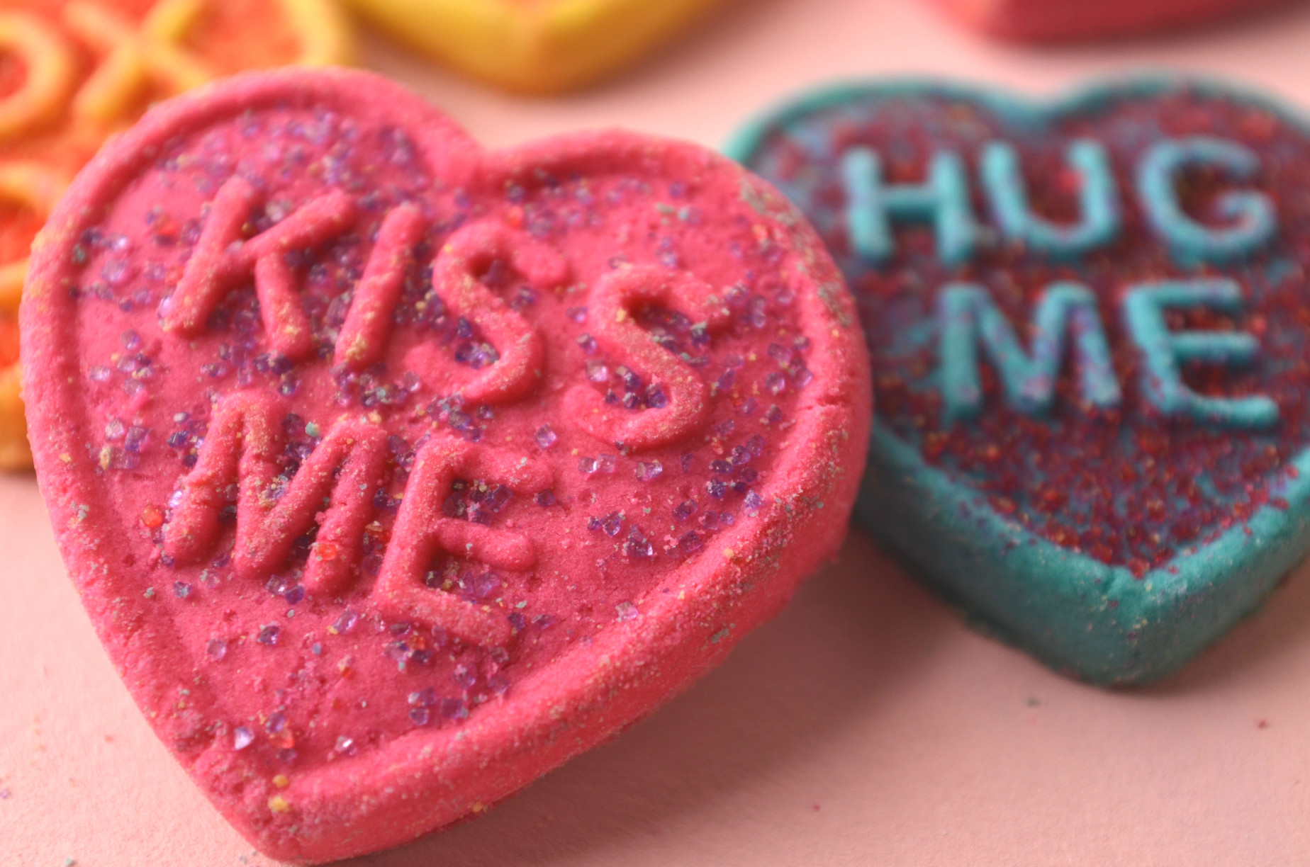 Heart shape cookies with kiss me hug me message