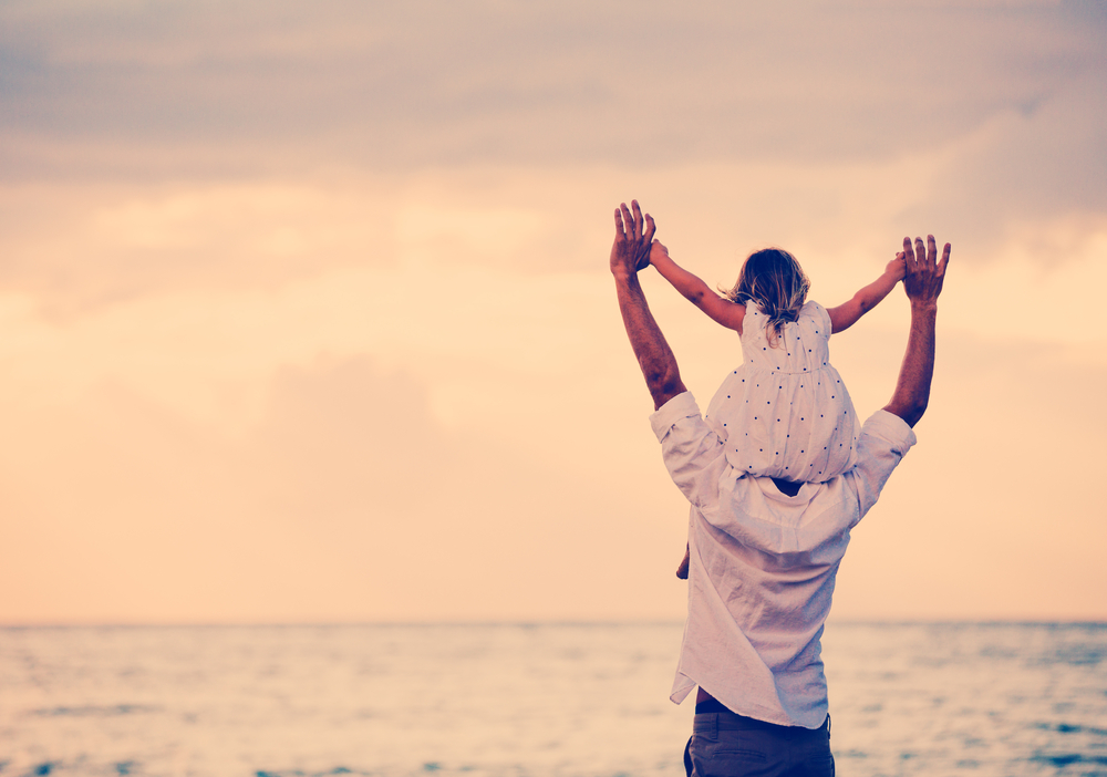 Father and Daughter Playing Together at the Beach