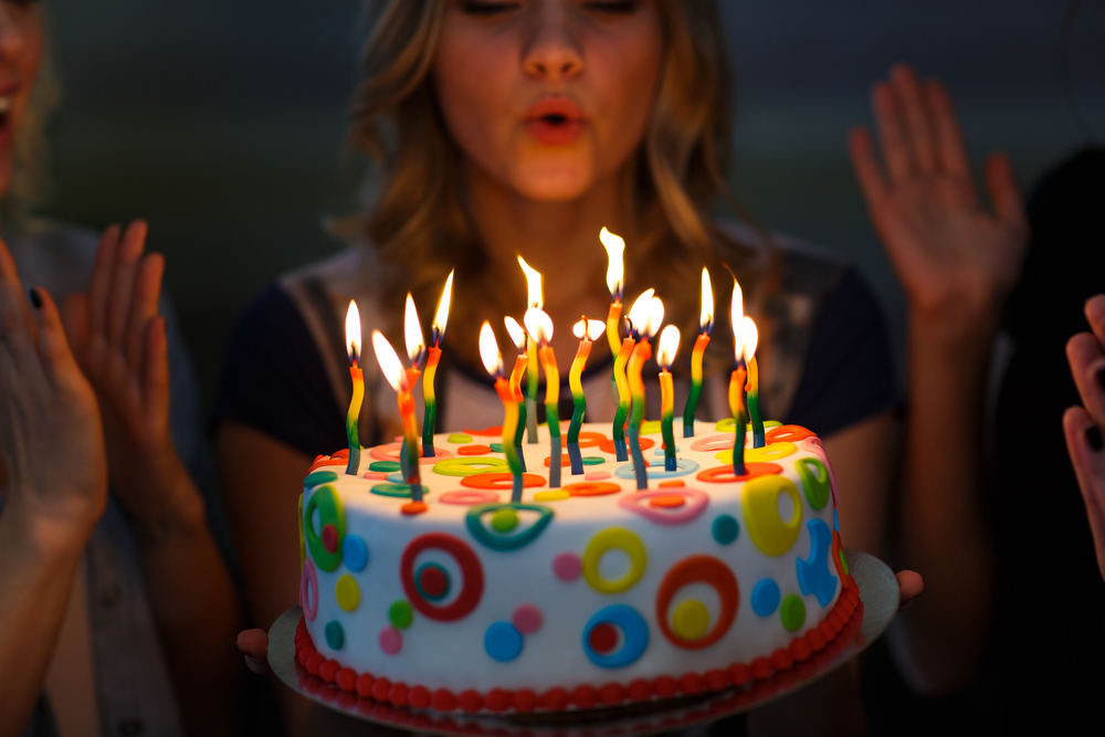 cake while blowing candles